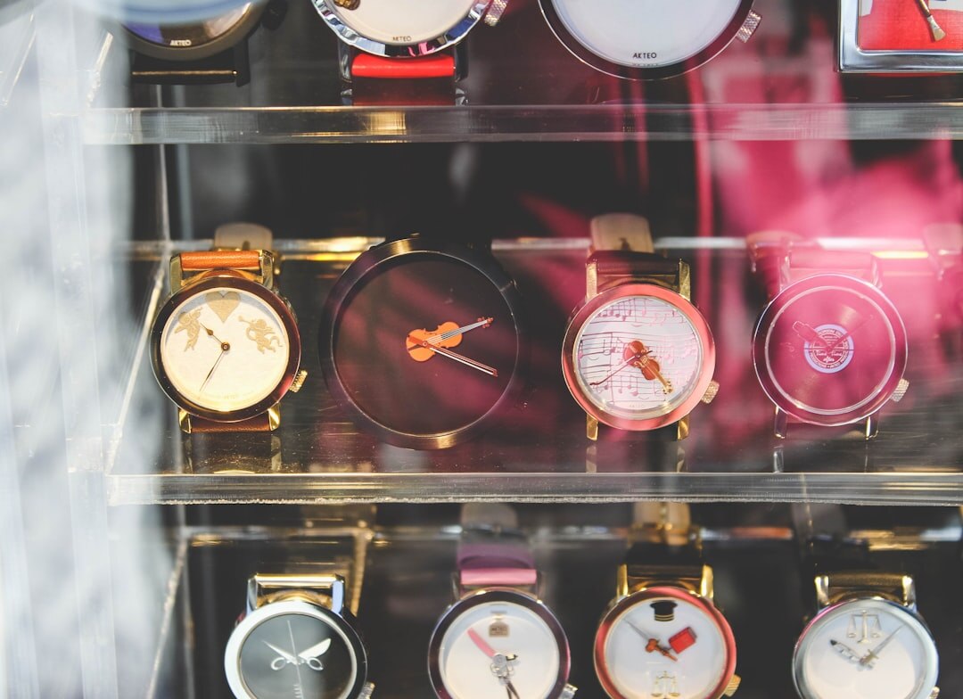 man choosing watch in store