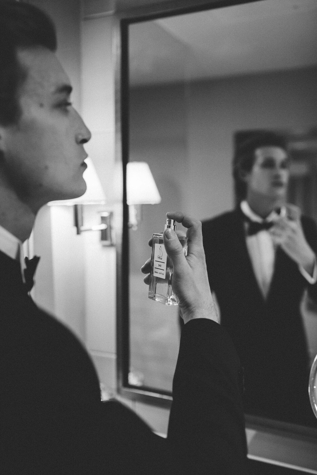 man with luxury perfume bottle